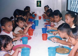 Children feeding in Ecuador